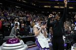 Mar 8, 2026; Sacramento, California, USA; Sacramento Kings center Maxine Raynaud (42) and center Dylan Cardwell (right) react after defeating the Chicago Bulls at Golden 1 Center. Mandatory Credit: Dennis Lee-Imagn Images