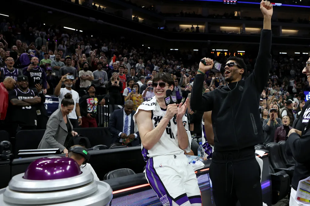 Mar 8, 2026; Sacramento, California, USA; Sacramento Kings center Maxine Raynaud (42) and center Dylan Cardwell (right) react after defeating the Chicago Bulls at Golden 1 Center. Mandatory Credit: Dennis Lee-Imagn Images