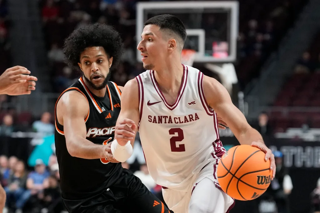March 8, 2026; Las Vegas, NV, USA; Santa Clara Broncos guard Sash Gavalyugov (2) dribbles the basketball against Pacific Tigers guard Jaden Clayton (6) during the first half at Orleans Arena. Mandatory Credit: Kyle Terada-Imagn Images