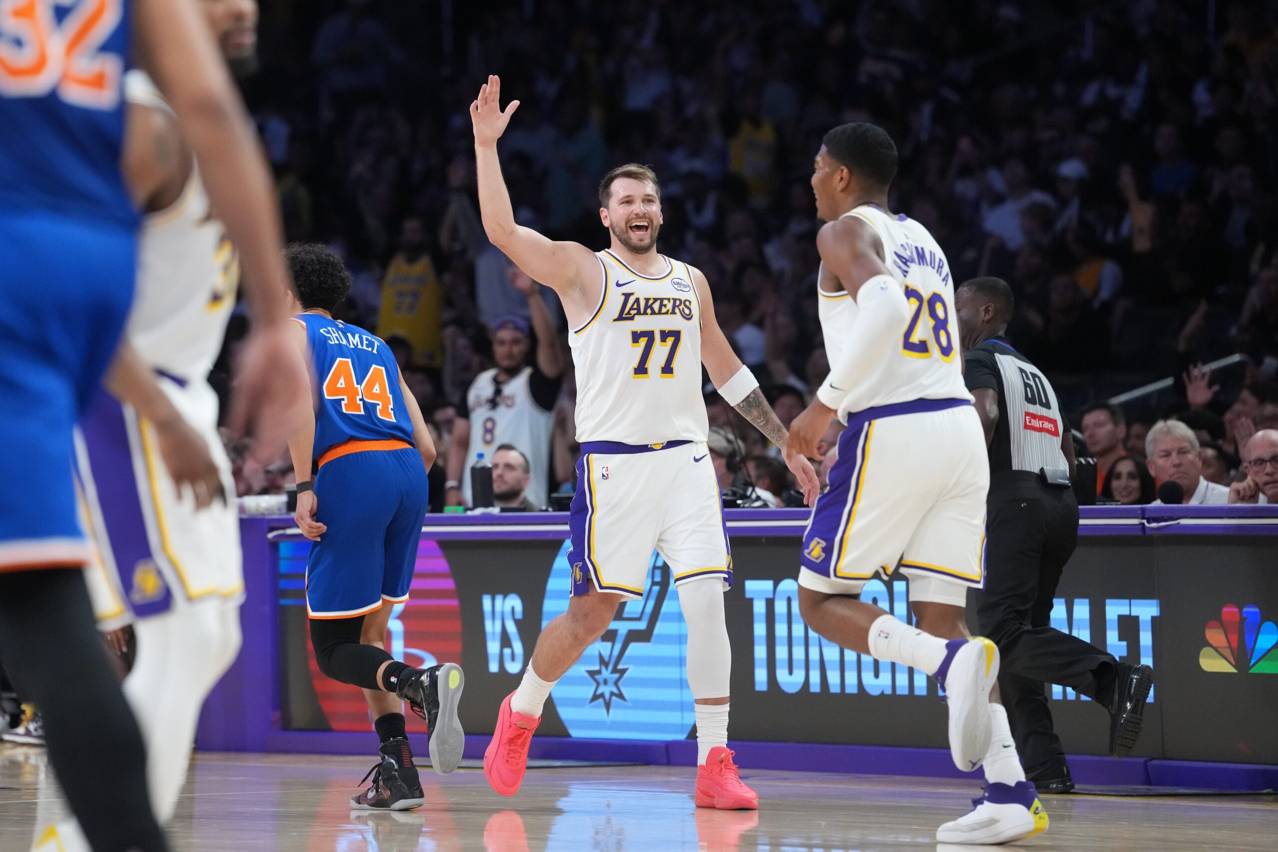 Mar 8, 2026; Los Angeles, California, USA; Los Angeles Lakers guard Luka Doncic (77) celebrates with forward Rui Hachimura (28) against the New York Knicks in the second half at Crypto.com Arena. Mandatory Credit: Kirby Lee-Imagn Images