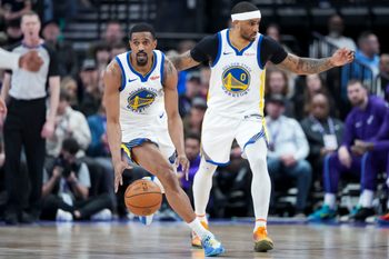 Mar 9, 2026; Salt Lake City, Utah, USA; Golden State Warriors guard De'Anthony Melton (8) dribbles down the court ahead of guard Gary Payton II (0) in the fourth quarter at Delta Center.  Mandatory Credit: Gabriel Mayberry-Imagn Images