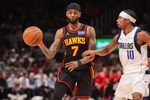 Mar 10, 2026; Atlanta, Georgia, USA; Atlanta Hawks guard Nickeil Alexander-Walker (7) passes the ball against the Dallas Mavericks in the third quarter at State Farm Arena. Mandatory Credit: Brett Davis-Imagn Images