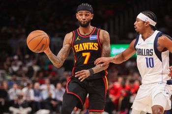 Mar 10, 2026; Atlanta, Georgia, USA; Atlanta Hawks guard Nickeil Alexander-Walker (7) passes the ball against the Dallas Mavericks in the third quarter at State Farm Arena. Mandatory Credit: Brett Davis-Imagn Images