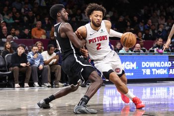 Mar 10, 2026; Brooklyn, New York, USA;  Detroit Pistons guard Cade Cunningham (2) looks to drive past Brooklyn Nets guard Drake Powell (4) in the third quarter at Barclays Center. Mandatory Credit: Wendell Cruz-Imagn Images
