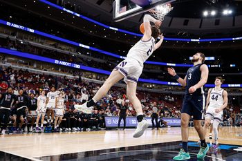 Mar 10, 2026; Chicago, IL, USA; Northwestern Wildcats forward Nick Martinelli (2) scores against the Penn State Nittany Lions during the second half at United Center. Mandatory Credit: Kamil Krzaczynski-Imagn Images
