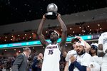 March 10, 2026; Las Vegas, NV, USA; Gonzaga Bulldogs forward Graham Ike (15) hoists the most outstanding player trophy after defeating the Santa Clara Broncos at Orleans Arena. Mandatory Credit: Kyle Terada-Imagn Images