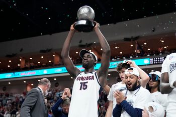 March 10, 2026; Las Vegas, NV, USA; Gonzaga Bulldogs forward Graham Ike (15) hoists the most outstanding player trophy after defeating the Santa Clara Broncos at Orleans Arena. Mandatory Credit: Kyle Terada-Imagn Images