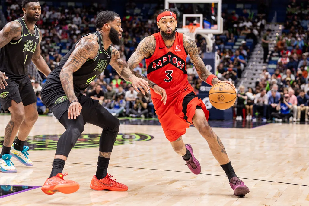 Mar 11, 2026; New Orleans, Louisiana, USA; Toronto Raptors forward Brandon Ingram (3) dribbles against New Orleans Pelicans guard/forward Saddiq Bey (41) during the second half at Smoothie King Center. Mandatory Credit: Stephen Lew-Imagn Images