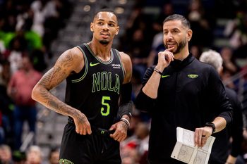 Mar 11, 2026; New Orleans, Louisiana, USA;  New Orleans Pelicans guard Dejounte Murray (5) talks to New Orleans Pelicans Interim Head Coach James Borrego against the Toronto Raptors during the second half at Smoothie King Center. Mandatory Credit: Stephen Lew-Imagn Images