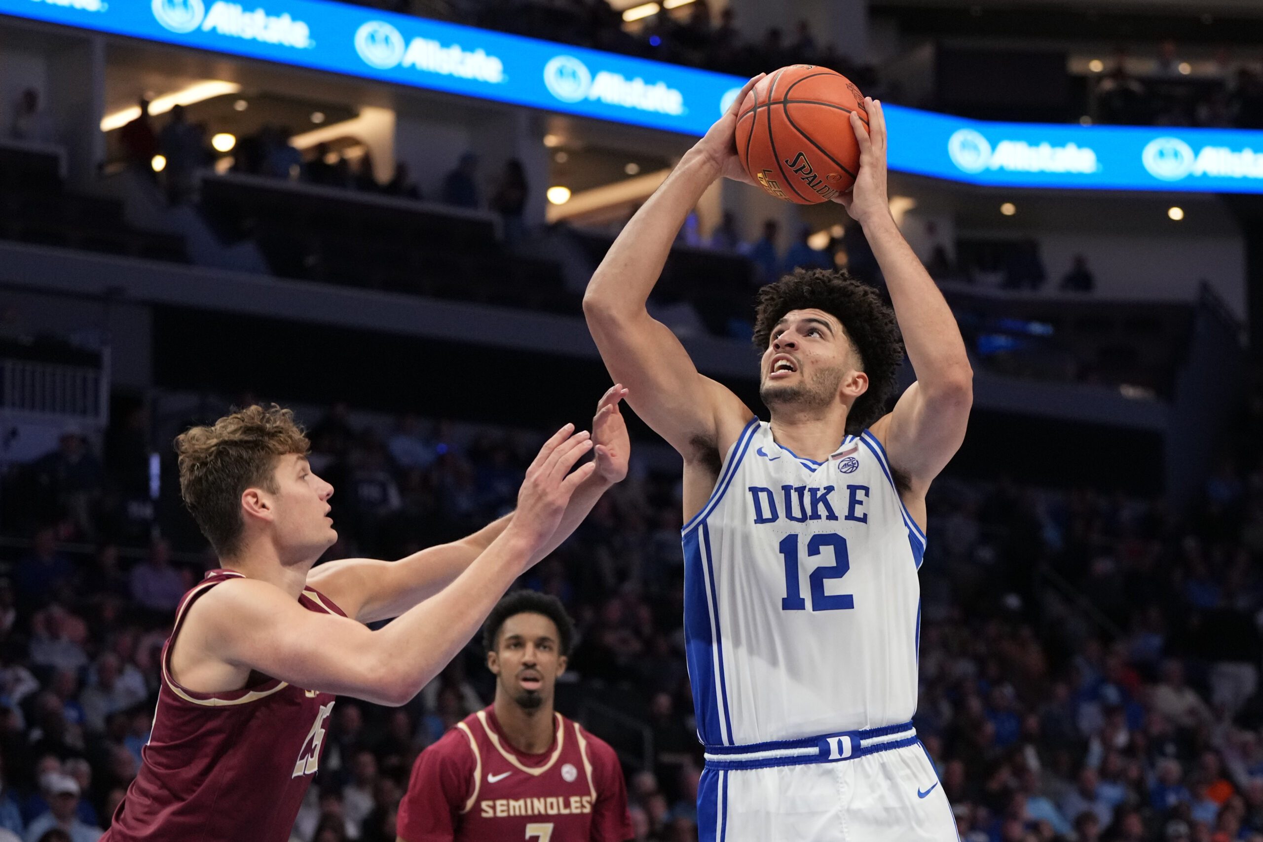 Mar 12, 2026; Charlotte, NC, USA; Duke Blue Devils forward Cameron Boozer (12) shoots as Florida State Seminoles forward Alex Steen (25) defends in the second half at Spectrum Center. Mandatory Credit: Bob Donnan-Imagn Images