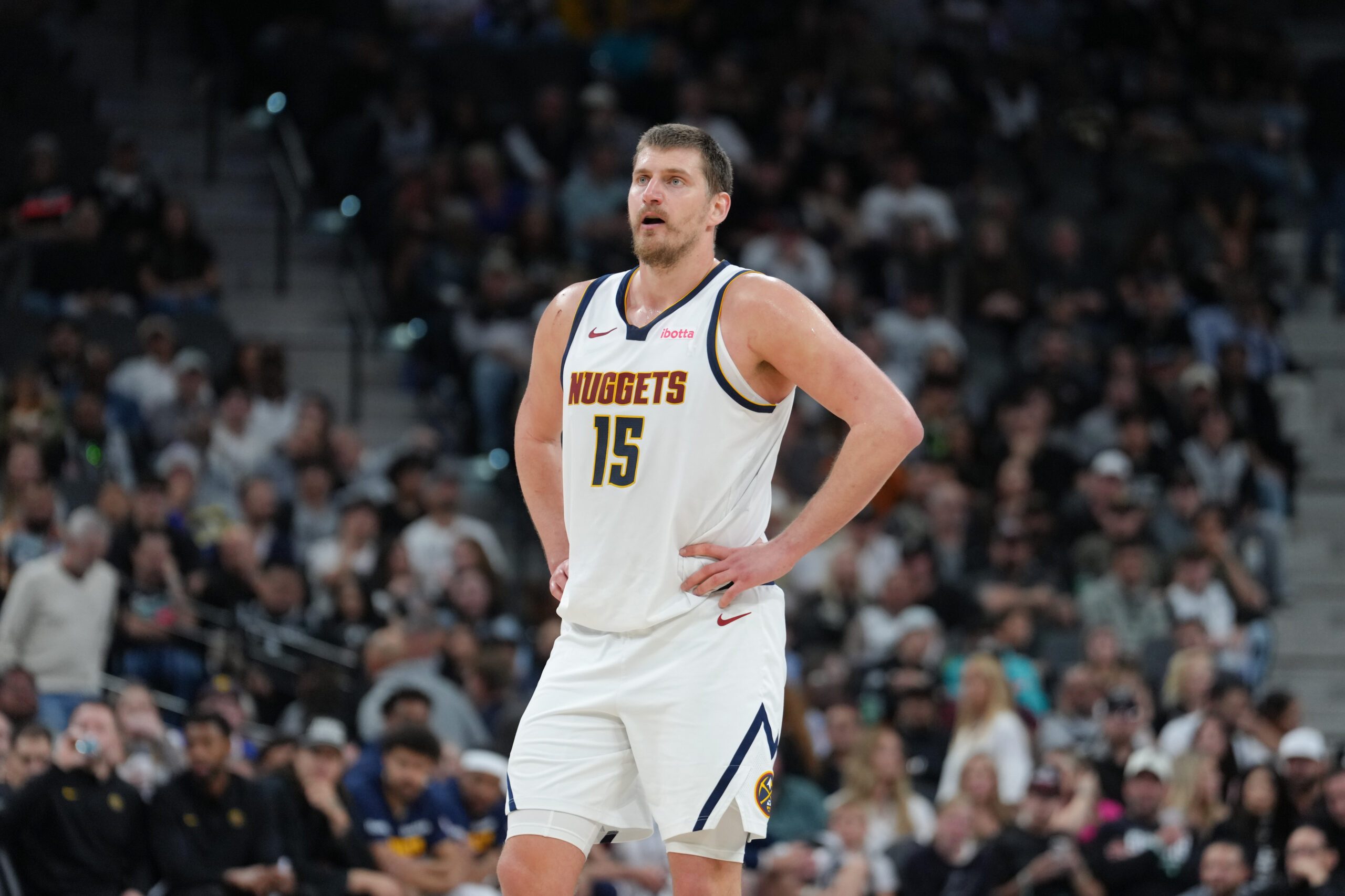 Mar 12, 2026; San Antonio, Texas, USA;  Denver Nuggets center Nikola Jokic (15) looks over in the first half against the San Antonio Spurs at Frost Bank Center. Mandatory Credit: Daniel Dunn-Imagn Images