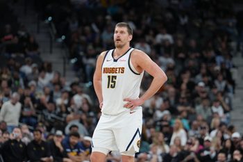 Mar 12, 2026; San Antonio, Texas, USA;  Denver Nuggets center Nikola Jokic (15) looks over in the first half against the San Antonio Spurs at Frost Bank Center. Mandatory Credit: Daniel Dunn-Imagn Images