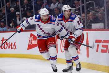 Mar 12, 2026; Winnipeg, Manitoba, CAN; New York Rangers forward Conor Sheary (43) and New York Rangers forward Tye Kartye (24) look for the puck in the Winnipeg Jets during the first period at Canada Life Centre. Mandatory Credit: Terrence Lee-Imagn Images