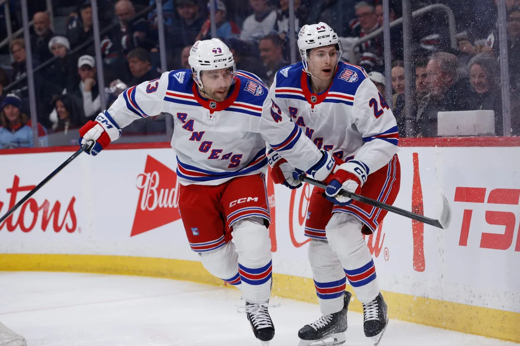 Mar 12, 2026; Winnipeg, Manitoba, CAN; New York Rangers forward Conor Sheary (43) and New York Rangers forward Tye Kartye (24) look for the puck in the Winnipeg Jets during the first period at Canada Life Centre. Mandatory Credit: Terrence Lee-Imagn Images