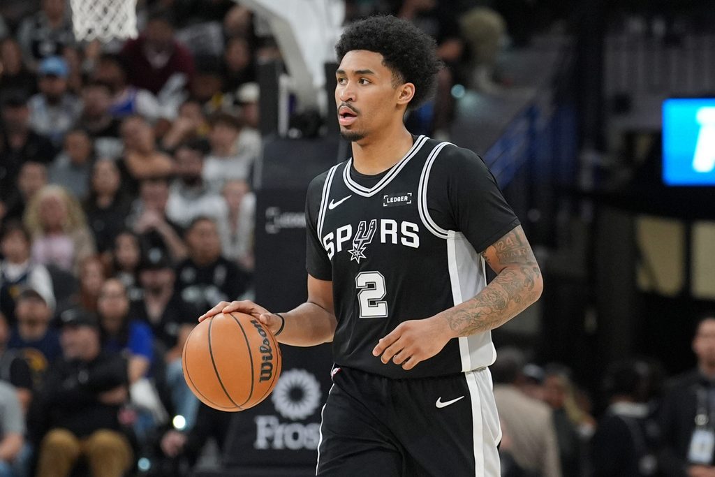 Mar 12, 2026; San Antonio, Texas, USA; San Antonio Spurs guard Dylan Harper (2) dribbles the ball in the second half against the Denver Nuggets at Frost Bank Center. Mandatory Credit: Daniel Dunn-Imagn Images