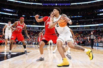 Mar 13, 2026; Chicago, IL, USA; Michigan Wolverines forward Yaxel Lendeborg (23) drives to the basket against the Ohio State Buckeyes during the second half at United Center. Mandatory Credit: Kamil Krzaczynski-Imagn Images