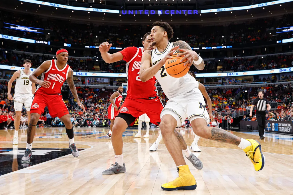 Mar 13, 2026; Chicago, IL, USA; Michigan Wolverines forward Yaxel Lendeborg (23) drives to the basket against the Ohio State Buckeyes during the second half at United Center. Mandatory Credit: Kamil Krzaczynski-Imagn Images