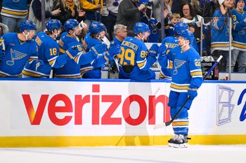 Mar 13, 2026; St. Louis, Missouri, USA; St. Louis Blues center Pius Suter (22) is congratulated by teammates after scoring against the Edmonton Oilers during the third period at Enterprise Center. Mandatory Credit: Jeff Curry-Imagn Images
