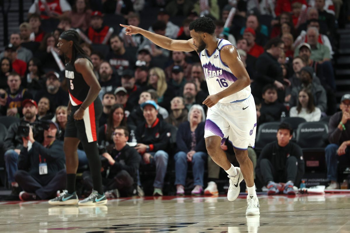 Mar 13, 2026; Portland, Oregon, USA;  Utah Jazz guard Elijah Harkless (16) reacts after scoring against the Portland Trail Blazers during the second half at Moda Center. Mandatory Credit: Jaime Valdez-Imagn Images