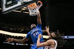 Mar 13, 2026; Kansas City, MO, USA; Kansas Jayhawks forward Flory Bidunga (40) dunks during the second half against the Houston Cougars at T-Mobile Center. Mandatory Credit: William Purnell-Imagn Images