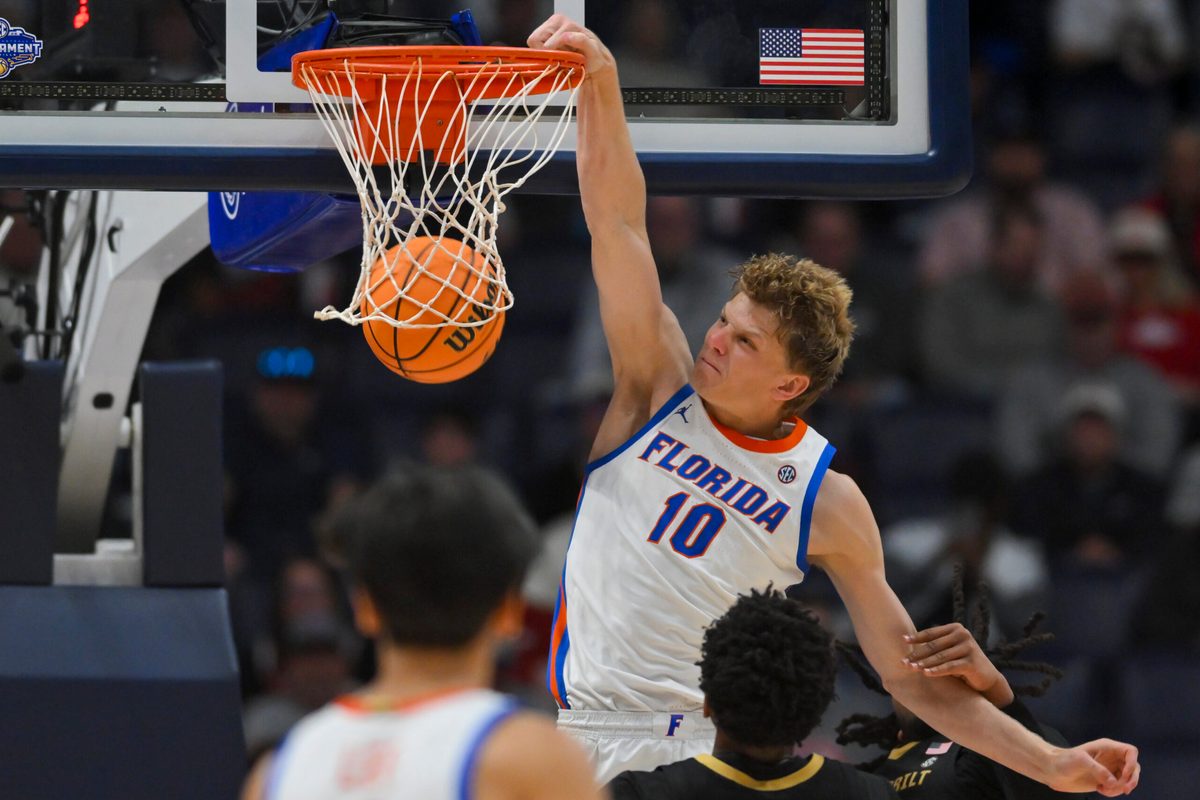Mar 14, 2026; Nashville, TN, USA; Florida Gators forward Thomas Haugh (10) dunks the ball against the Vanderbilt Commodores during the second half at Bridgestone Arena. Mandatory Credit: Steve Roberts-Imagn Images