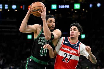 Mar 14, 2026; Boston, Massachusetts, USA; Boston Celtics forward Jayson Tatum (0) drives to the basket against Washington Wizards guard Will Riley (27) during the first half at the TD Garden. Mandatory Credit: Brian Fluharty-Imagn Images
