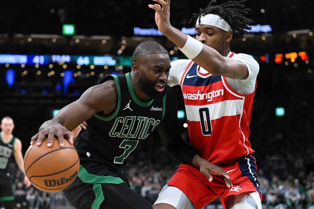 Mar 14, 2026; Boston, Massachusetts, USA; Boston Celtics guard Jaylen Brown (7) drives to the basket against Washington Wizards guard Bilal Coulibaly (0) during the first half at the TD Garden. Mandatory Credit: Brian Fluharty-Imagn Images
