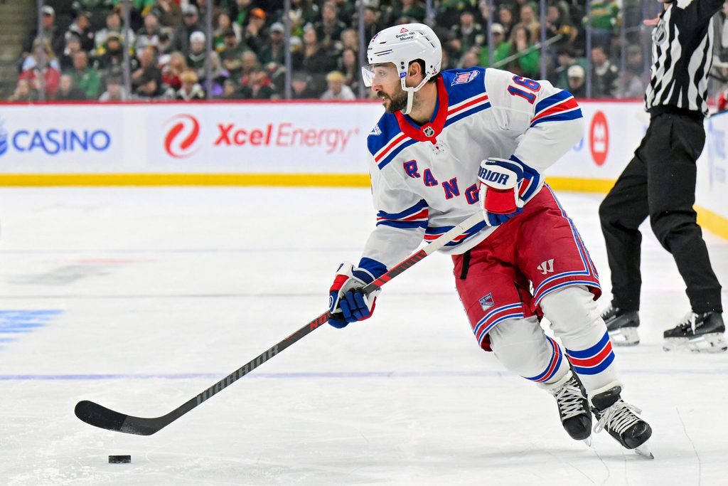 Mar 14, 2026; Saint Paul, Minnesota, USA; New York Rangers forward Vincent Trocheck (16) controls the puck against the Minnesota Wild during the third period at Grand Casino Arena. Mandatory Credit: Nick Wosika-Imagn Images