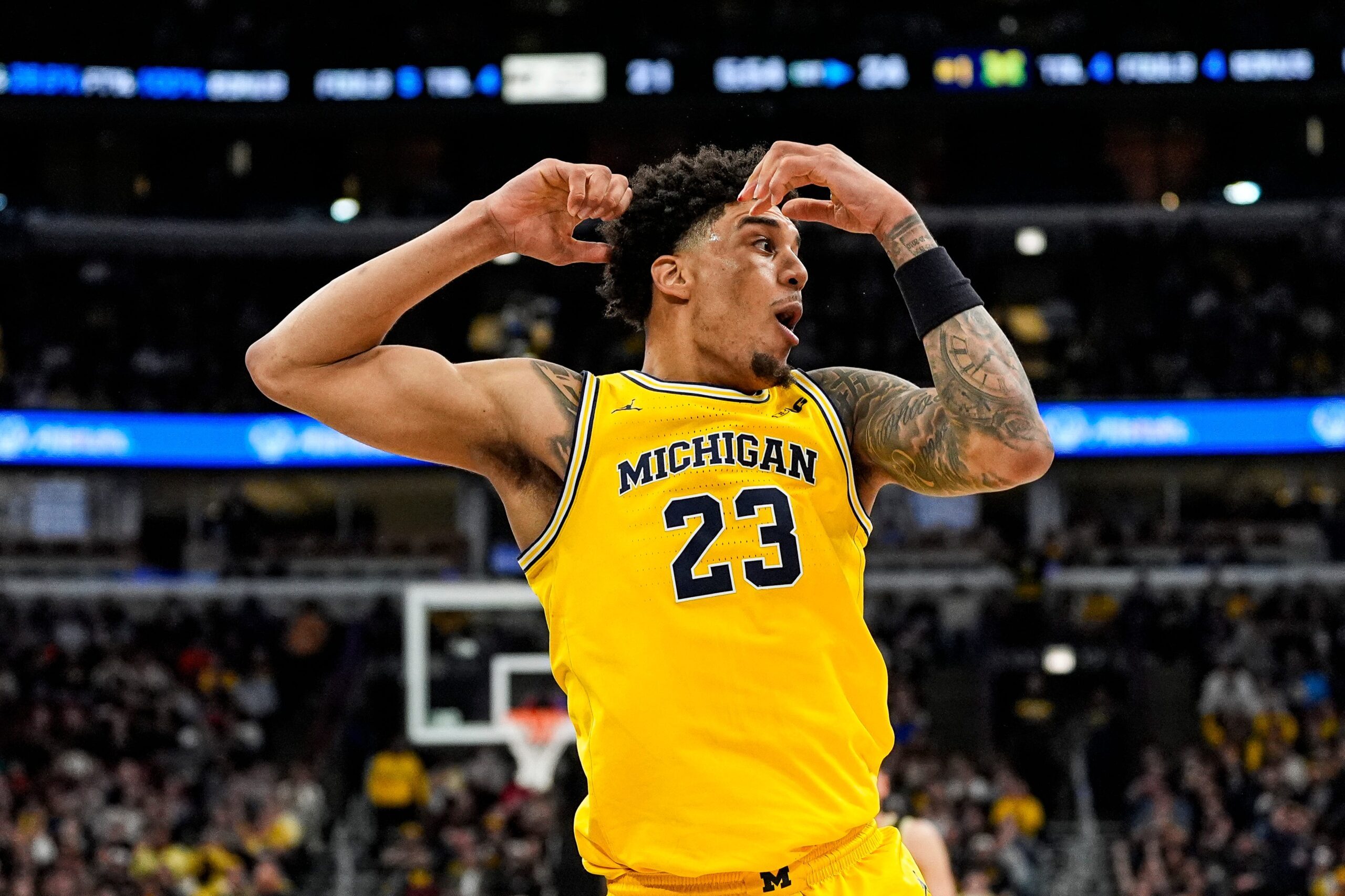 Michigan forward Yaxel Lendeborg (23) reacts being called a personal foul against him during the first half of Big Ten Tournament final against Purdue at United Center in Chicago on Sunday, March 15, 2026.