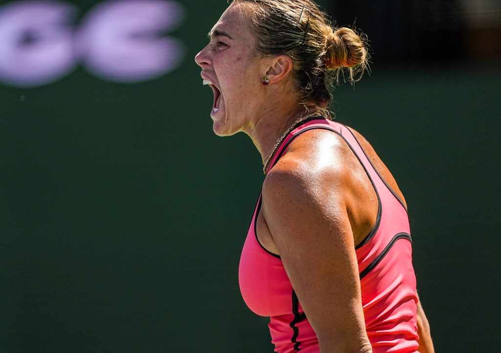 Aryna Sabalenka screams in celebration as she reaches advantage in the fourth game of the third set with a 2-1 lead over Elena Rybakina in the women’s singles championship final at the BNP Paribas Open in Indian Wells, Calif., Sunday, March 15, 2026.