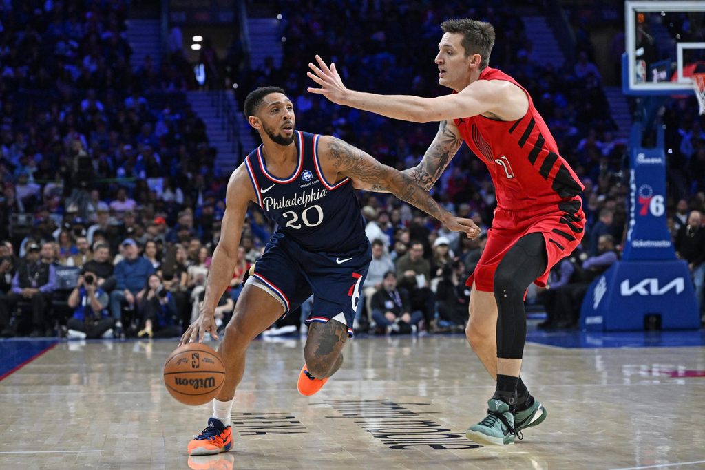 Mar 15, 2026; Philadelphia, Pennsylvania, USA; Philadelphia 76ers guard Cameron Payne (20) drives to the basket against Portland Trail Blazers guard Vit Krejci (27) during the second half at Xfinity Mobile Arena. Mandatory Credit: Eric Hartline-Imagn Images