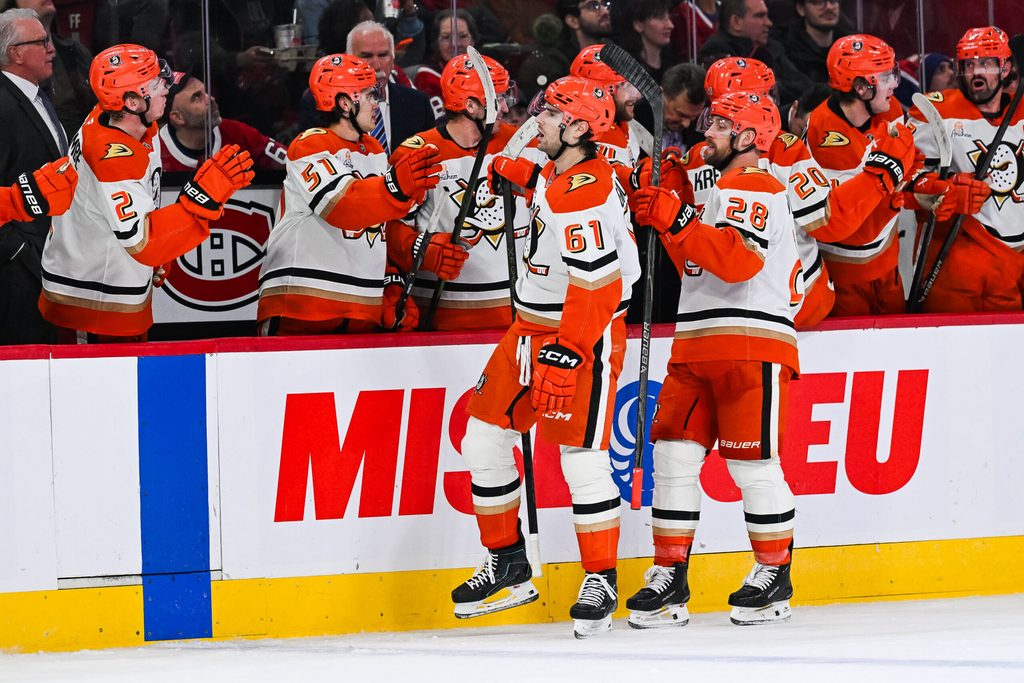 Mar 15, 2026; Montreal, Quebec, CAN; Anaheim Ducks left wing Cutter Gauthier (61) celebrates with his teammates at the bench his goal against the Montreal Canadiens during the third period at Bell Centre. Mandatory Credit: David Kirouac-Imagn Images