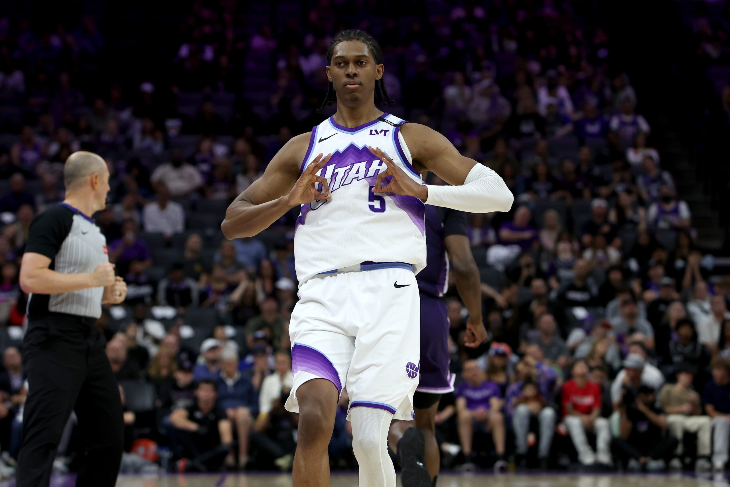 Mar 15, 2026; Sacramento, California, USA; Utah Jazz forward Cody Williams (5) reacts towards his bench after making a three-point basket against the Sacramento Kings during the fourth quarter at Golden 1 Center. Mandatory Credit: Dennis Lee-Imagn Images