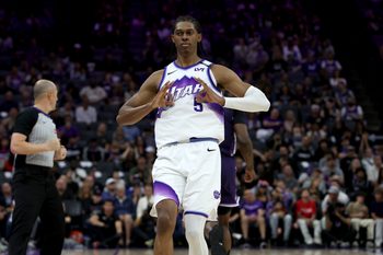 Mar 15, 2026; Sacramento, California, USA; Utah Jazz forward Cody Williams (5) reacts towards his bench after making a three-point basket against the Sacramento Kings during the fourth quarter at Golden 1 Center. Mandatory Credit: Dennis Lee-Imagn Images