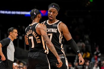 Mar 16, 2026; Atlanta, Georgia, USA; Atlanta Hawks guard Nickeil Alexander-Walker (7) and forward Onyeka Okongwu (17) react during the game against the Orlando Magic during the second half at State Farm Arena. Mandatory Credit: Dale Zanine-Imagn Images