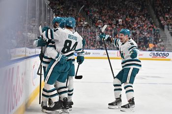 Mar 17, 2026; Edmonton, Alberta, CAN; San Jose Sharks left winger Pavol Regenda (84) with defenseman Dmitry Orlov (9) celebrate a goal on Edmonton Oilers goalie Connor Ingram (39) (not pictured) during the second period at Rogers Place. Mandatory Credit: Walter Tychnowicz-Imagn Images
