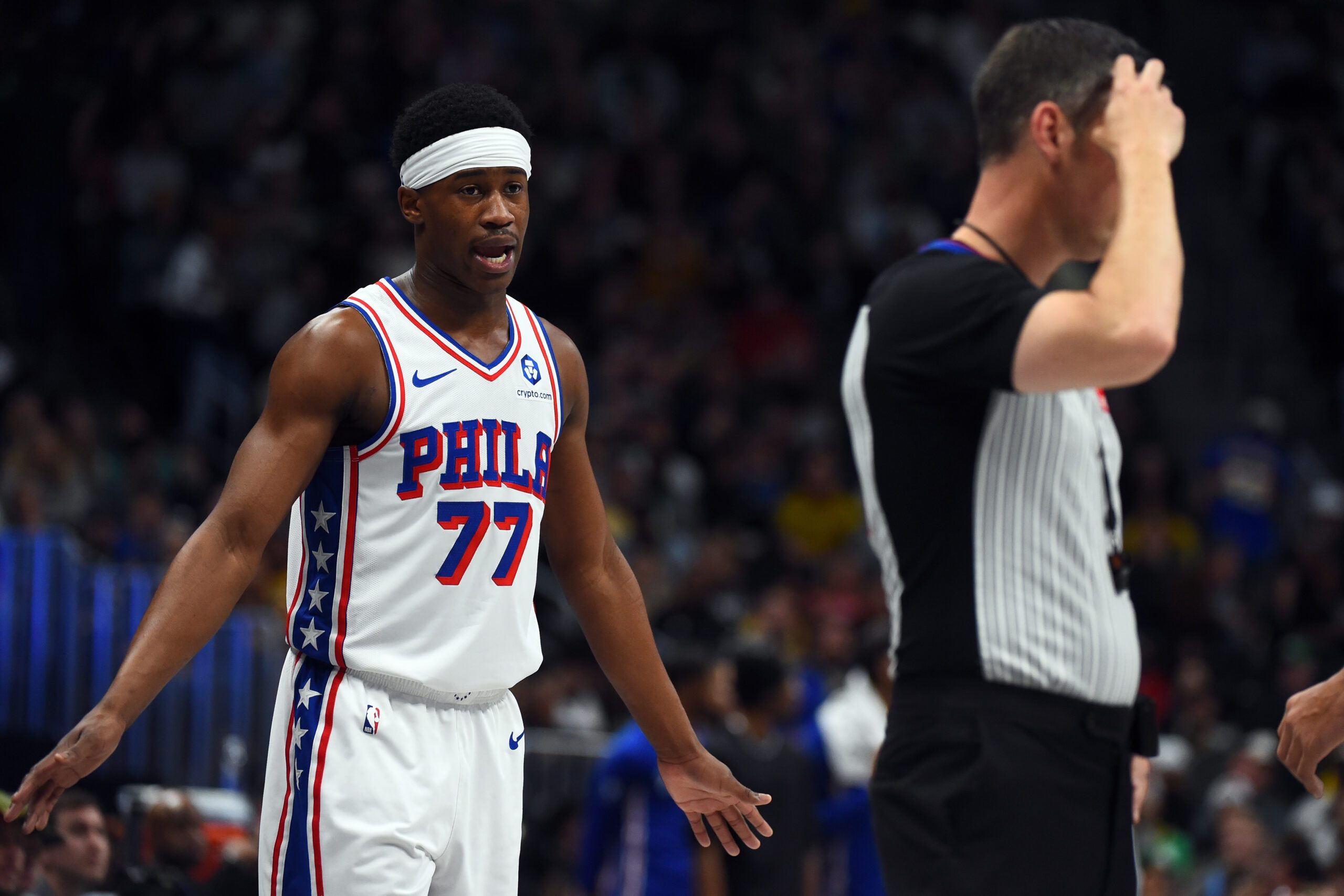Mar 17, 2026; Denver, Colorado, USA; Philadelphia 76ers guard VJ Edgecombe (77) questions a call by an official during the first half against the Denver Nuggets at Ball Arena. Mandatory Credit: Christopher Hanewinckel-Imagn Images