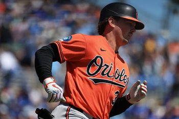 Mar 18, 2026; Dunedin, Florida, USA;  Baltimore Orioles catcher Adley Rutschman (35) singles during the first inning against the Toronto Blue Jays at TD Ballpark. Mandatory Credit: Kim Klement Neitzel-Imagn Images
