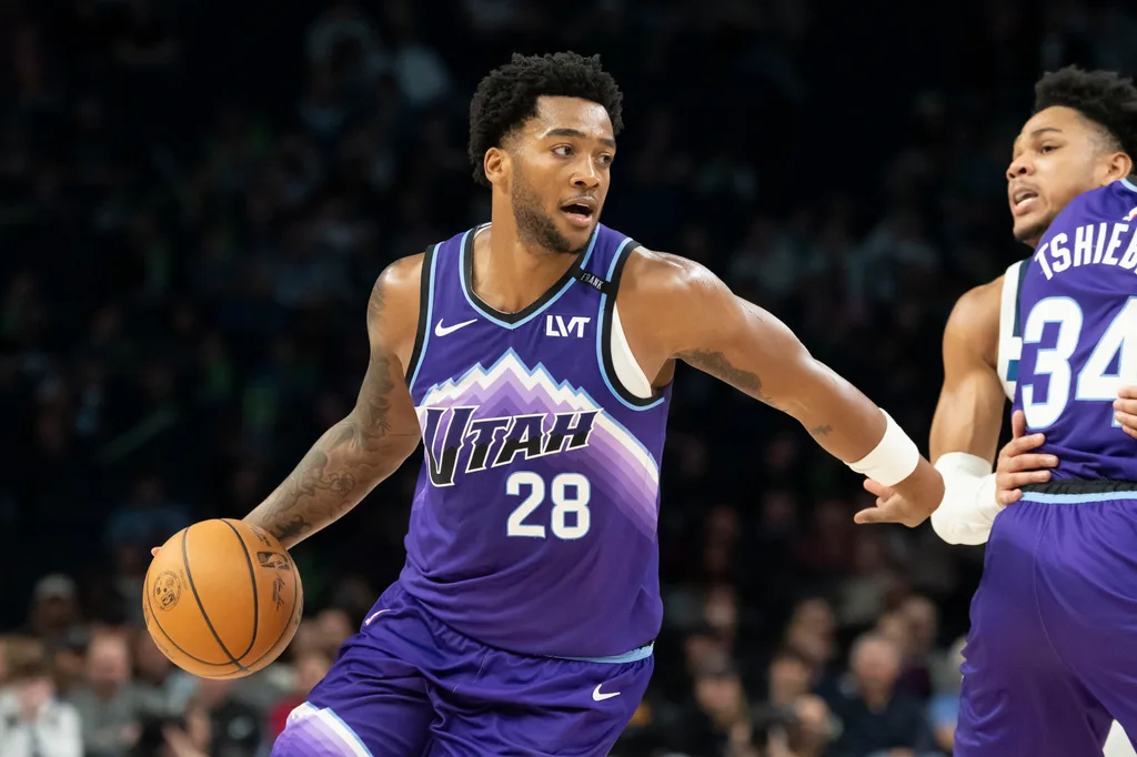 Mar 18, 2026; Minneapolis, Minnesota, USA; Utah Jazz forward Brice Sensabaugh (28) dribbles the ball against the Minnesota Timberwolves in the second half at Target Center. Mandatory Credit: Jesse Johnson-Imagn Images