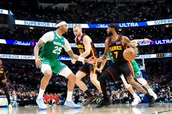 Mar 18, 2026; Dallas, Texas, USA; Atlanta Hawks guard Nickeil Alexander-Walker (7) controls the ball as Dallas Mavericks forward P.J. Washington (25) defends during the second half at American Airlines Center. Mandatory Credit: Kevin Jairaj-Imagn Images
