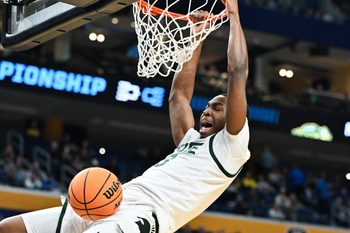 Mar 19, 2026; Buffalo, NY, USA; Michigan State Spartans forward Cameron Ward (3) dunks during the second half against the North Dakota State Bison during a first round game of the men's 2026 NCAA Tournament at Keybank Center. Mandatory Credit: Mark Konezny-Imagn Images