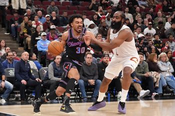 Mar 19, 2026; Chicago, Illinois, USA; Cleveland Cavaliers guard James Harden (1) defends against Chicago Bulls guard Tre Jones (30) during the second half at United Center. Mandatory Credit: David Banks-Imagn Images
