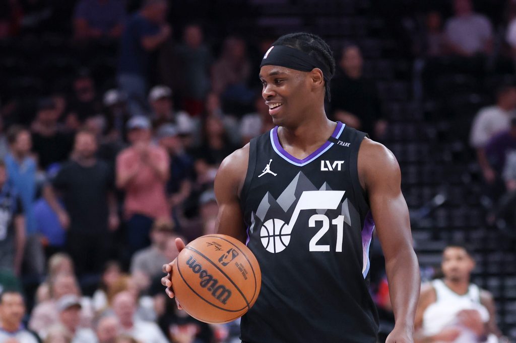 Mar 19, 2026; Salt Lake City, Utah, USA; Utah Jazz guard Bez Mbeng (21) dribbles as the clock runs out to end the game against the Milwaukee Bucks at Delta Center. Mandatory Credit: Rob Gray-Imagn Images