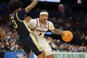 Mar 20, 2026; Tampa, FL, USA; Texas Tech Red Raiders forward Lejuan Watts (3) drives against Akron Zips guard Sharron Young (3) in the second half during a first round game of the men's 2026 NCAA Tournament at Benchmark International Arena. Mandatory Credit: Nathan Ray Seebeck-Imagn Images