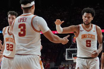 Iowa State Cyclones guard Tamin Lipsey (3)celebrates with forward Joshua Jefferson (5) and forward Milan Momcilovic (22) after a three-point play during the second half on Jan. 2, 2026, at Hilton Coliseum in Ames, Iowa.