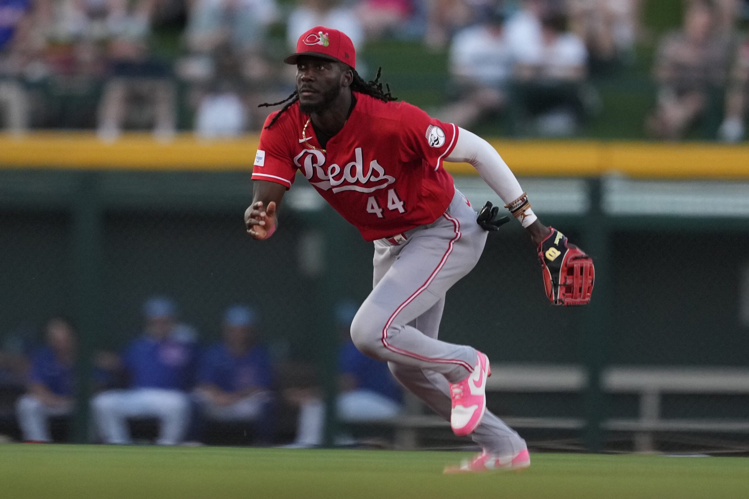 Mar 20, 2026; Mesa, Arizona, USA; Cincinnati Reds shortstop Elly de la Cruz (44) makes the play against the Chicago Cubs in the second inning at Sloan Park. Mandatory Credit: Rick Scuteri-Imagn Images