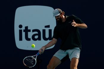 Mar 20, 2026; Miami Gardens, FL, USA; Reilly Opelka (USA) hits a forehand against Jack Draper (GBR) (not pictured) on day four of the 2026 Miami Open at Hard Rock Stadium. Mandatory Credit: Geoff Burke-Imagn Images