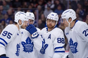 Mar 21, 2026; Ottawa, Ontario, CAN; Toronto Maple Leafs defenseman Pillippe Myers (51) speaks with defenseman Oliver Ekman-Larsson (95) and right wing William Nylander (88) and defenseman Brandon Carlo (25) in the first period against the Ottawa Senators at the Canadian Tire Centre. Mandatory Credit: Marc DesRosiers-IMAGN Images