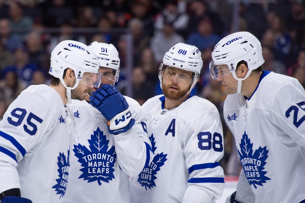 Mar 21, 2026; Ottawa, Ontario, CAN; Toronto Maple Leafs defenseman Pillippe Myers (51) speaks with defenseman Oliver Ekman-Larsson (95) and right wing William Nylander (88) and defenseman Brandon Carlo (25) in the first period against the Ottawa Senators at the Canadian Tire Centre. Mandatory Credit: Marc DesRosiers-IMAGN Images