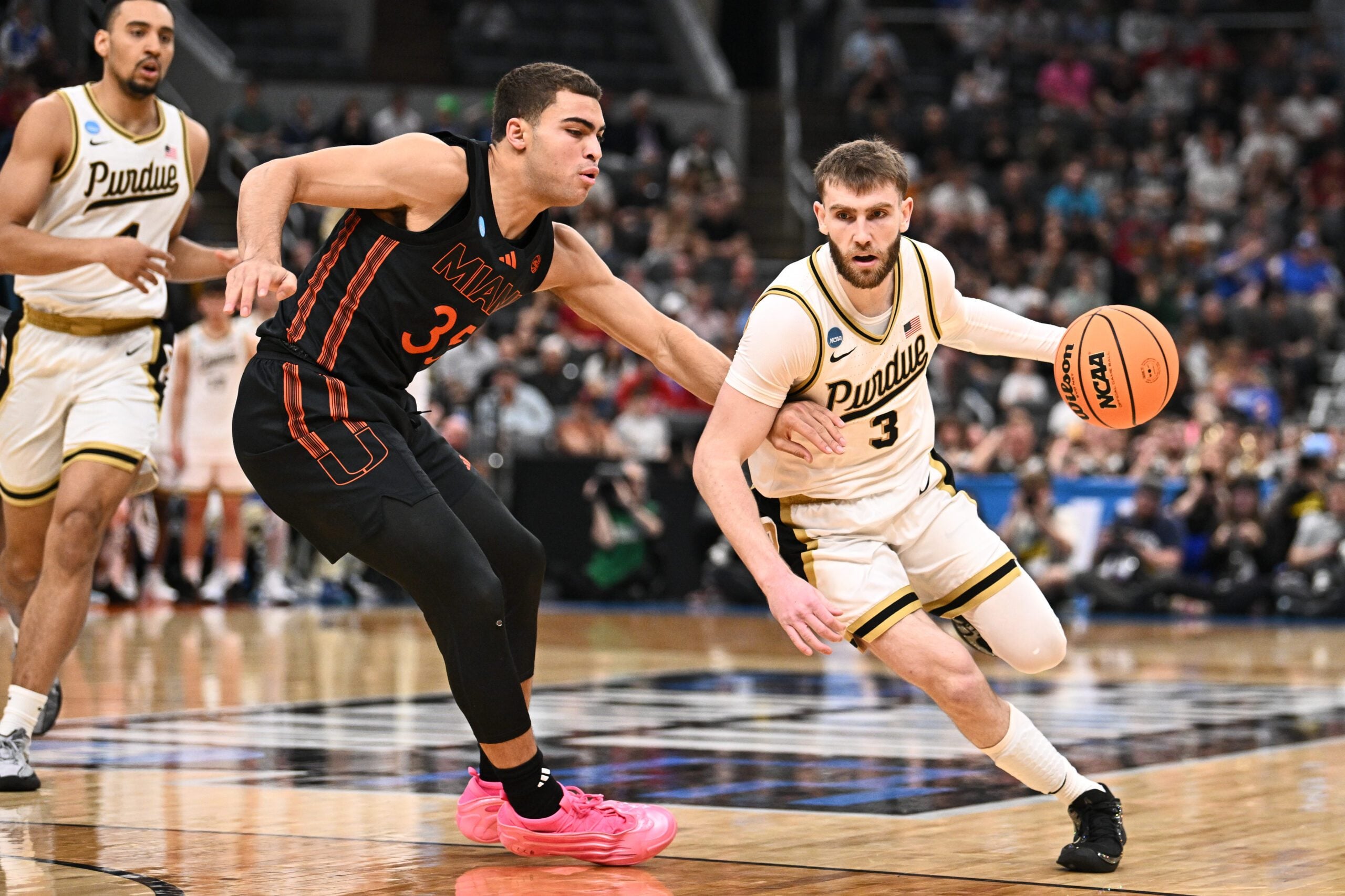 Mar 22, 2026; St. Louis, MO, USA; Purdue Boilermakers guard Braden Smith (3) drives against Miami Hurricanes guard Dante Allen (35) during the first half during a second round game of the men's 2026 NCAA Tournament at Enterprise Center. Mandatory Credit: Jeff Le-Imagn Images